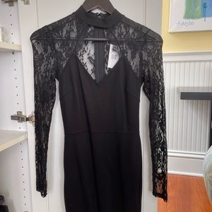 Guess new with tags never worn black mini dress